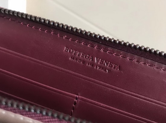 Bottega Veneta Intrecciato Nappa Zip Around Wallet in Dark Red Calfskin