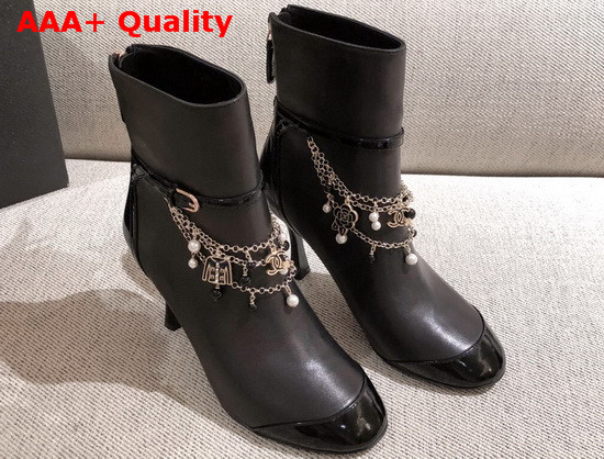 Chanel Ankle Boots in Black Calf Leather and Patent Leather with Chain Details Replica