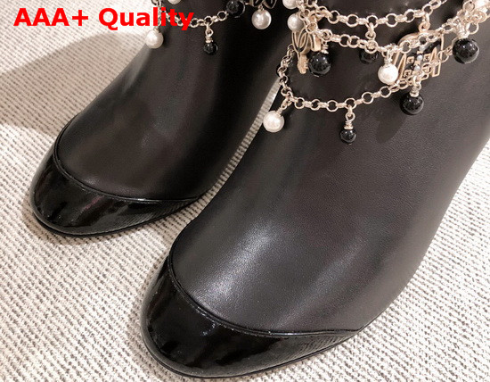 Chanel Ankle Boots in Black Calf Leather and Patent Leather with Chain Details Replica