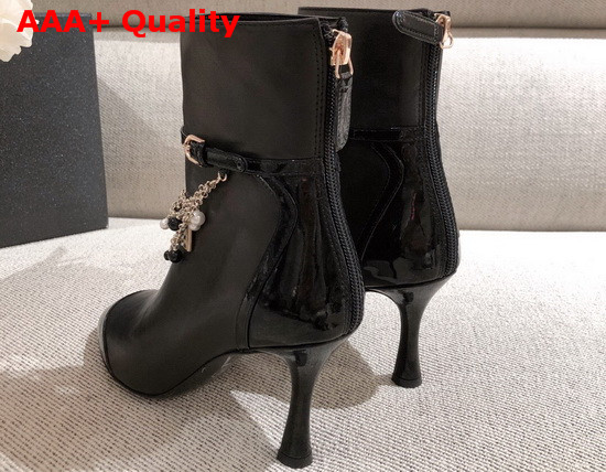 Chanel Ankle Boots in Black Calf Leather and Patent Leather with Chain Details Replica