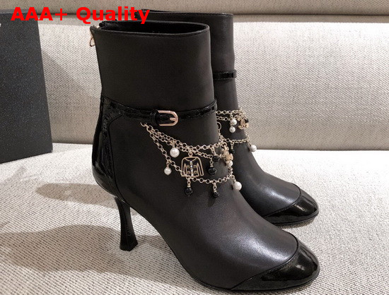 Chanel Ankle Boots in Black Calf Leather and Patent Leather with Chain Details Replica