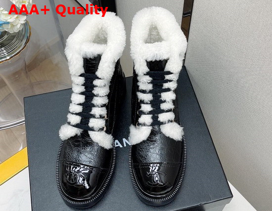 Chanel Ankle Boots in Black Calfskin with White Shearling Lining Replica