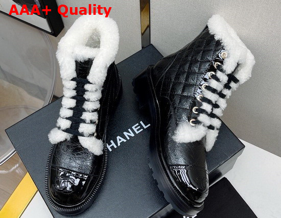 Chanel Ankle Boots in Black Calfskin with White Shearling Lining Replica