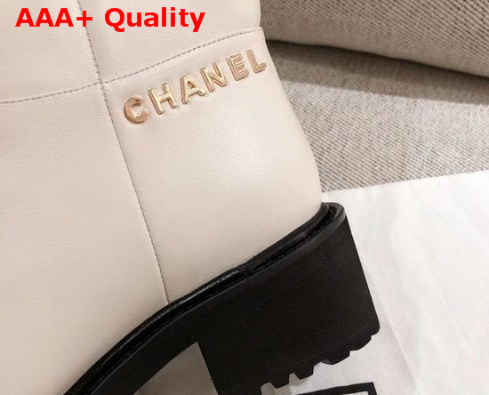 Chanel Ankle Boots in Ivory Calfskin with Gold Metal Logo G36749 Replica