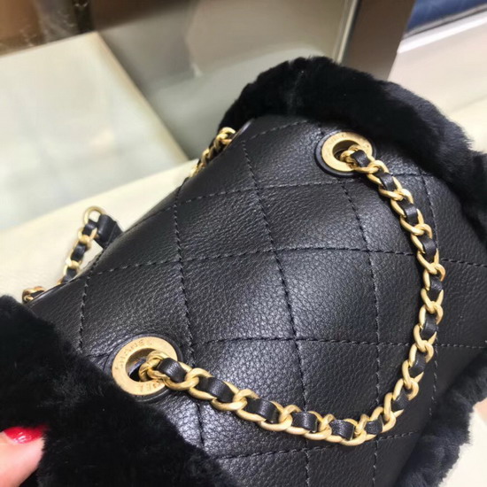 Chanel Backpack in Black Lambskin and Shearling Lambskin