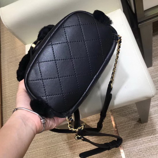 Chanel Backpack in Black Lambskin and Shearling Lambskin