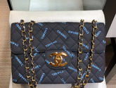 Chanel Big Flap Bag in Black Fabric with All Over Blue Printed Chanel Logo