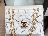 Chanel Big Flap Bag in White Fabric with All Over Black Printed Chanel Logo