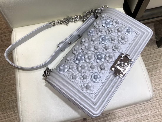 Chanel Boy Chanel Handbag in Silver Embroidered Metallic Grained Calfskin Silver Tone Metal