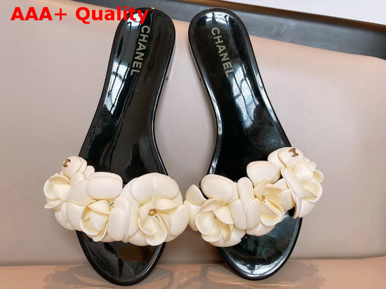 Chanel Camelia Mules in White and Black PVC Replica