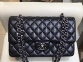 Chanel Classic Flap Bag in Black Lambskin with Silver Tone Metal Real Leather Lining