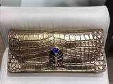 Chanel Clutch in Gold Metallic Crocodile Embossed Calfskin and Gold Metal AS0857