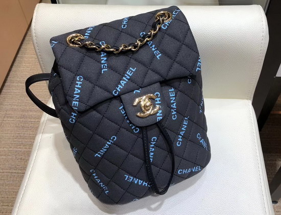 Chanel Fabric Backpack in Black with All Over Blue Chanel Logo