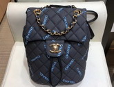 Chanel Fabric Backpack in Black with All Over Blue Chanel Logo