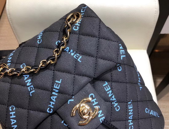 Chanel Fabric Backpack in Black with All Over Blue Chanel Logo