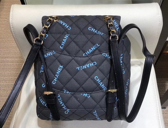 Chanel Fabric Backpack in Black with All Over Blue Chanel Logo