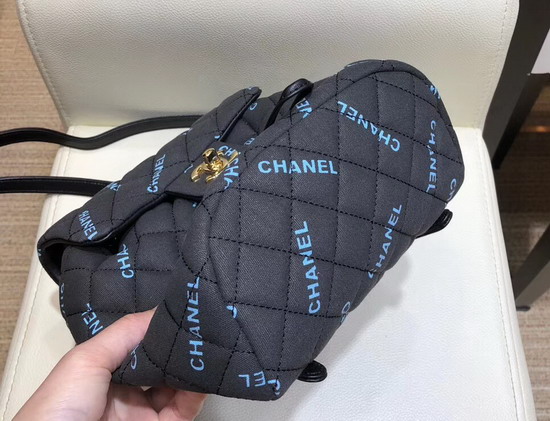 Chanel Fabric Backpack in Black with All Over Blue Chanel Logo