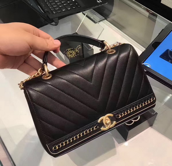 Chanel Flap Bag with Top Handle in Black Lambskin Gold Tone Metal For Sale