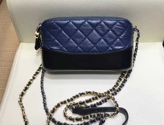 Chanel Gabrielle Clutch with Chain Aged Calfskin Smooth Calfskin Silver Tone and Gold Tone Metal Navy Blue and Black A94505