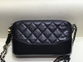 Chanel Gabrielle Clutch with Chain Black Aged Calfskin Smooth Calfskin Silver Tone and Gold Tone Metal A94505