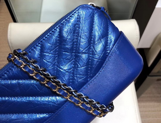 Chanel Gabrielle Clutch with Chain Electronic Blue Iridescent Aged Calfskin Gold Tone and Silver Tone Metal A94505