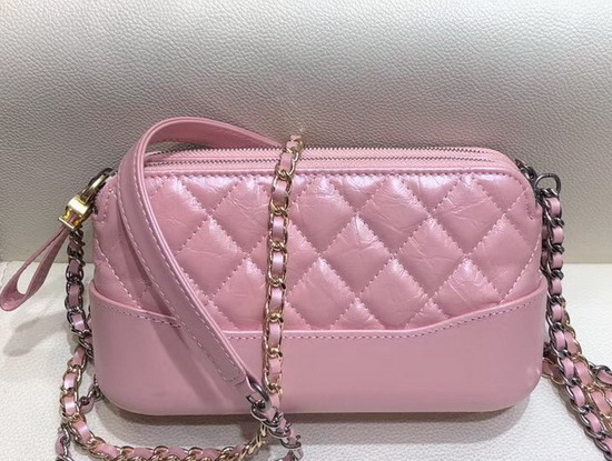 Chanel Gabrielle Clutch with Chain Pearl Pink Aged Calfskin Smooth Calfskin Silver Tone and Gold Tone Metal A94505