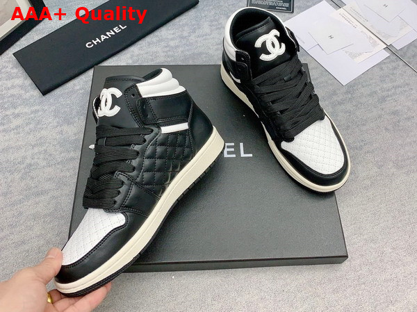 Chanel High Top Sneaker in Black and White Calfskin Replica