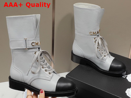 Chanel Lace Up Ankle Boots in White and Black Calfskin Replica