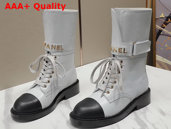 Chanel Lace Up Ankle Boots in White and Black Calfskin Replica