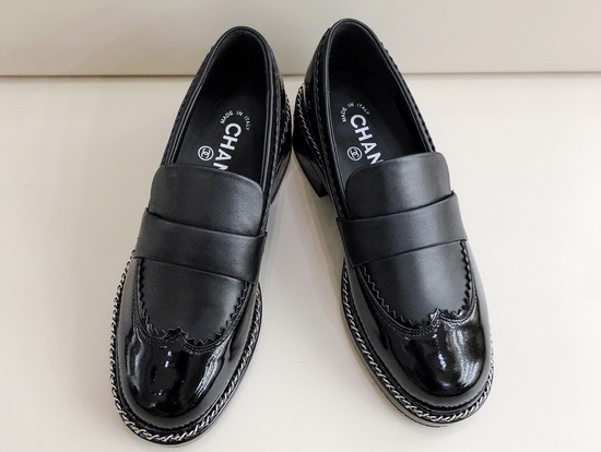 Chanel Lace Up Loafers in Black Calfskin and Patent Leather Replica