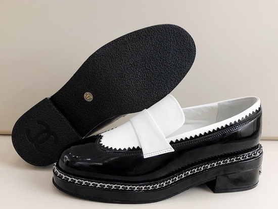 Chanel Lace Up Loafers in White Calfskin and Black Patent Leather Replica