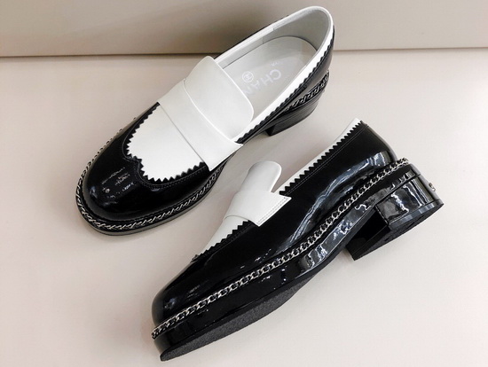 Chanel Lace Up Loafers in White Calfskin and Black Patent Leather Replica