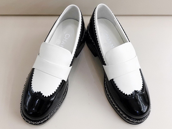 Chanel Lace Up Loafers in White Calfskin and Black Patent Leather Replica