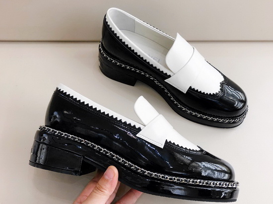 Chanel Lace Up Loafers in White Calfskin and Black Patent Leather Replica