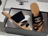 Chanel Large Coco Mules in Black Suede Calfskin