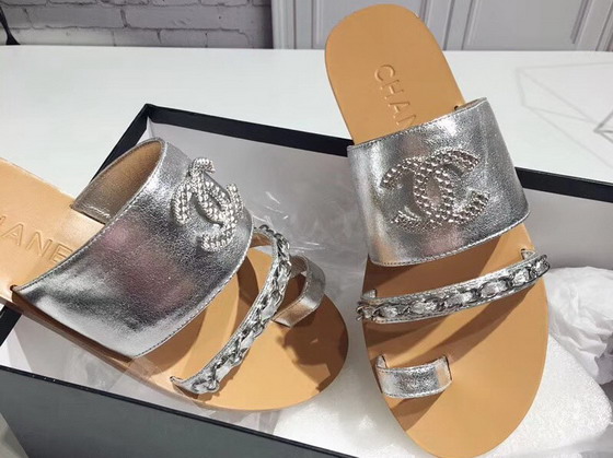 Chanel Large Coco Mules in Silver Lambskin