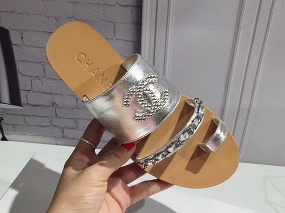 Chanel Large Coco Mules in Silver Lambskin