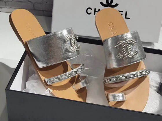 Chanel Large Coco Mules in Silver Lambskin