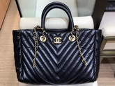 Chanel Large Shopping Bag in Aged Calfskin with Chevron Detail Black A57974