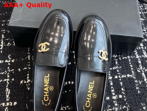 Chanel Loafers in Black Glazed Calfskin Embellished with Gold Metal CC Replica