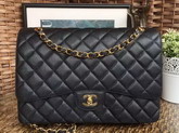 Chanel Maxi Caviar Flap Bag in Black with Gold Hardwares For Sale