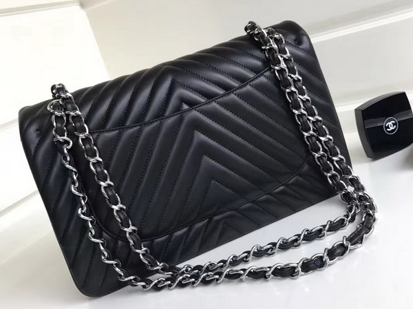 Chanel Maxi Flap Bag in Black Chevron Lambskin Silver Metal For Sale