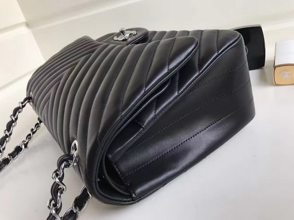 Chanel Maxi Flap Bag in Black Chevron Lambskin Silver Metal For Sale