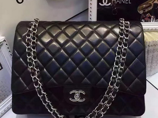 Chanel Maxi Flap Bag in Black Lambskin Silver Hardware For Sale