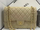 Chanel Maxi Flap Beige Caviar Leather For Sale