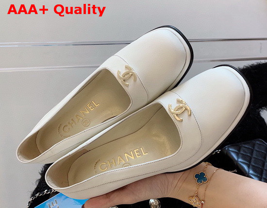 Chanel Mid Heel Pumps in White Calfskin with CC Emblem Replica