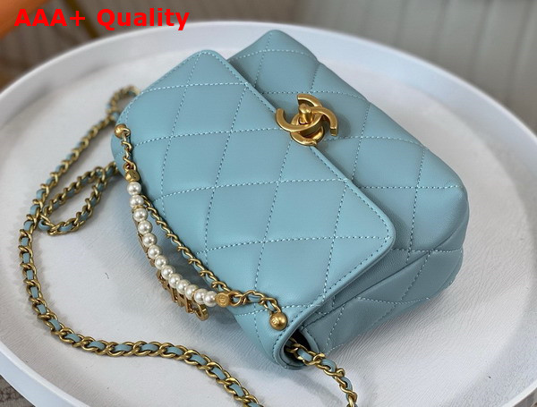 Chanel Mini Flap Bag Light Blue Lambskin Imitation Pearls Gold Tone Metal AS4986 Replica