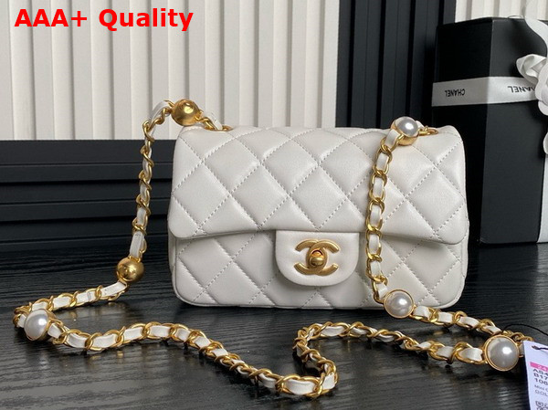 Chanel Mini Flap Bag White Shiny Lambskin Imitation Pearls Gold Tone Metal AS4947 Replica