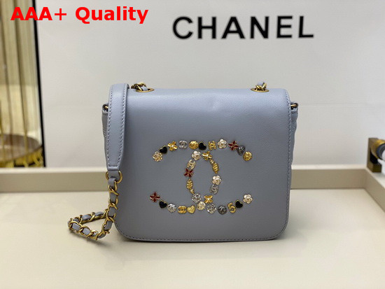 Chanel Mini Flap Bag in Light Blue with Charm Logo on the Front Replica