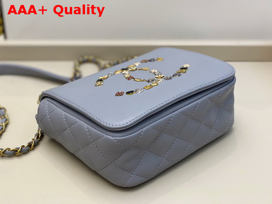 Chanel Mini Flap Bag in Light Blue with Charm Logo on the Front Replica